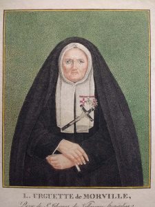 Cartoon print of a nurse. She is dressed wearing a nun's habit - black dress and veil, with a white covering framing her face. A cross is pinned to the white fabric over her heart. 