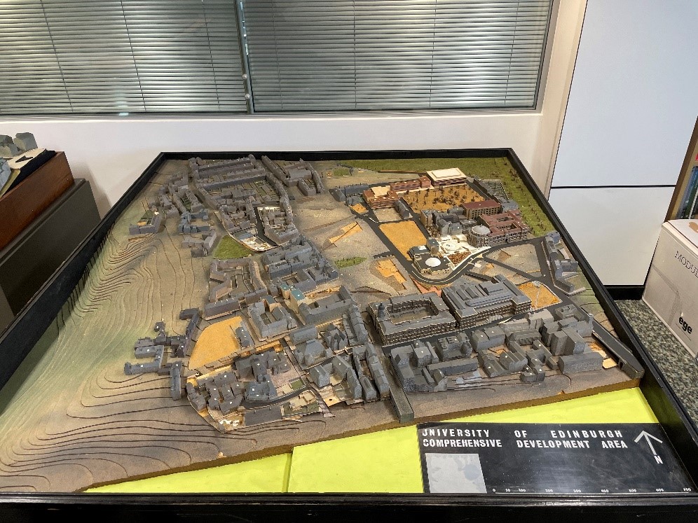 Model of the University of Edinburgh and its surrounding buildings on the hillside. 