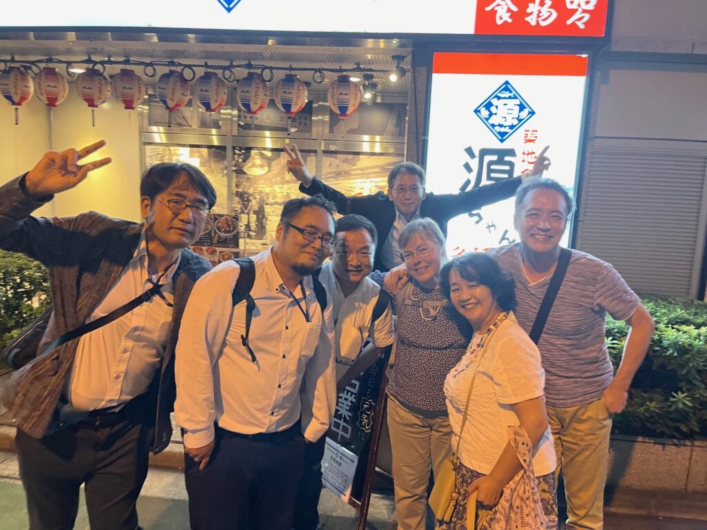 NII staff outside restaurant
